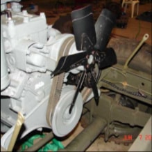 Halftrack engine with fan and pulley assembly installed