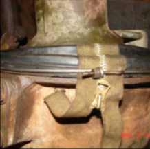 Halftrack axle boot and spring clip detail closeup