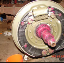 Halftrack brake drum with pink grease and hub