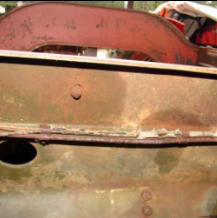 Frame rail showing rust and weld seam