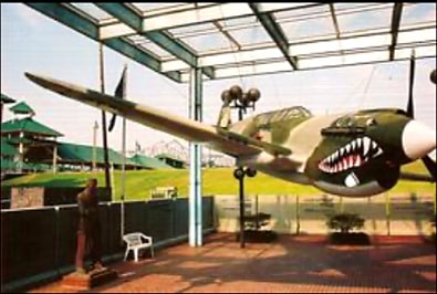 P-40 Warhawk full aircraft on display indoors
